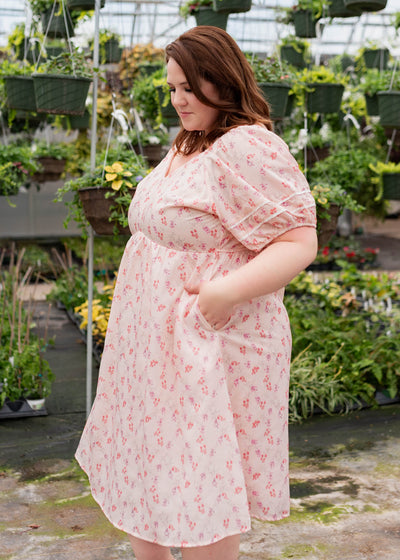 Side view of the blush floral dress in plus size