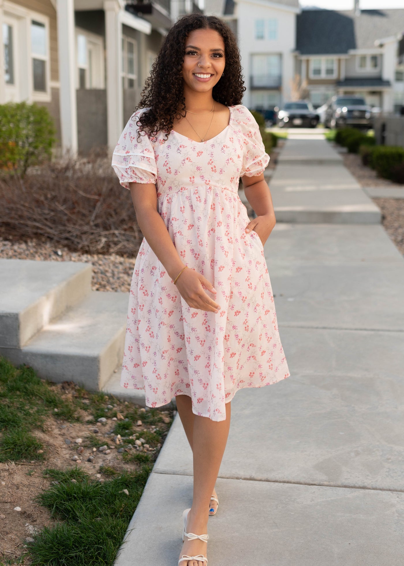 Blush floral dress with a wide v neck