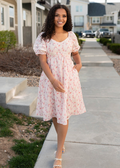 Blush floral dress with a wide v neck