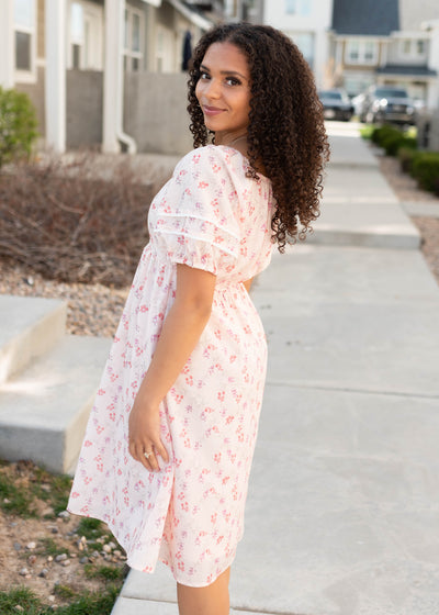 Side view of the blush floral dress