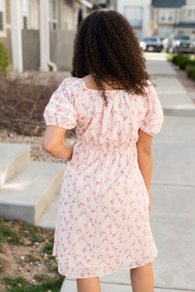 Back view of the blush floral dress