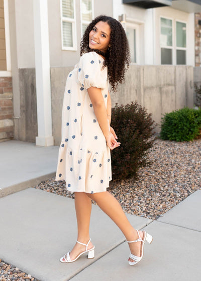 Side view of the natural embroidered dress
