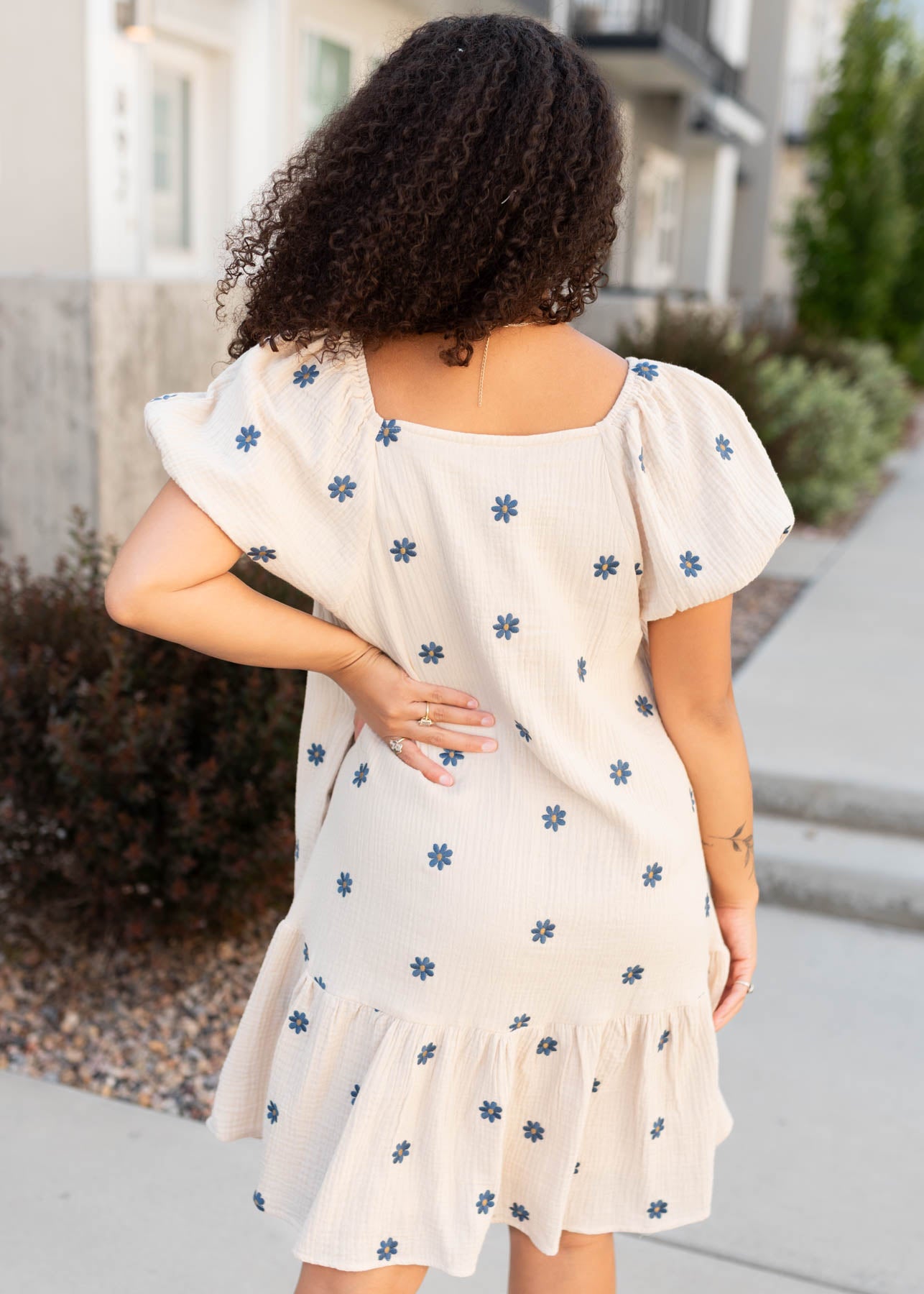 Back view of the natural embroidered dress