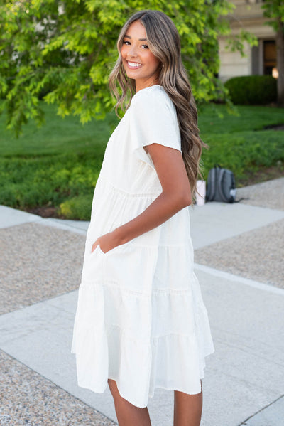 Side view of the ivory tiered dress