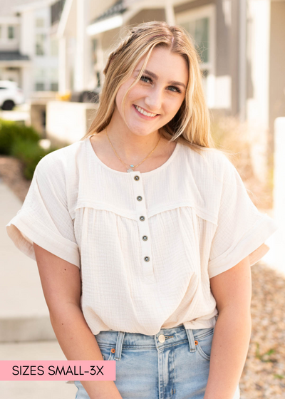 Short sleeve cream button top
