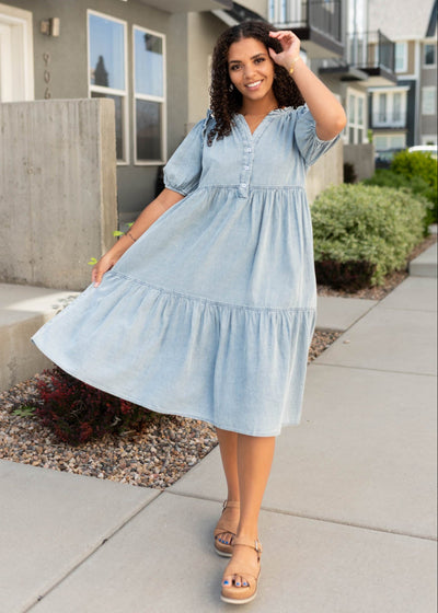 Ruffle around the neck on the chambray button down dress