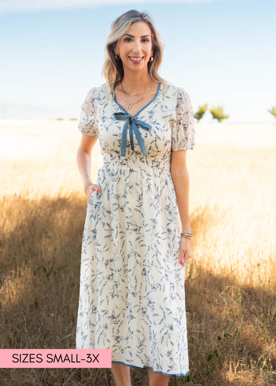 Cream floral dress with blue flowers