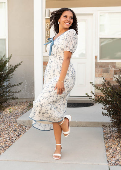 Cream floral dress with blue flowers