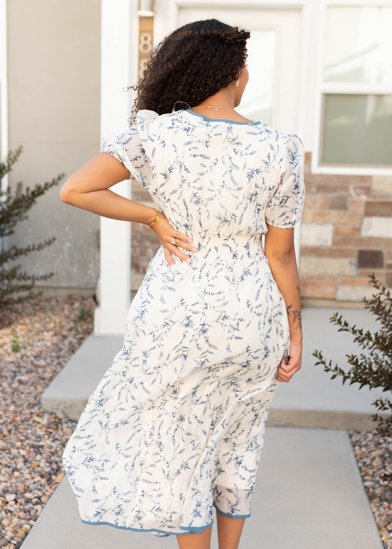 Back view of the cream floral dress