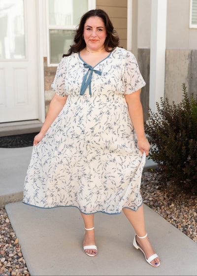 Short sleeve modest cream floral dress in plus size