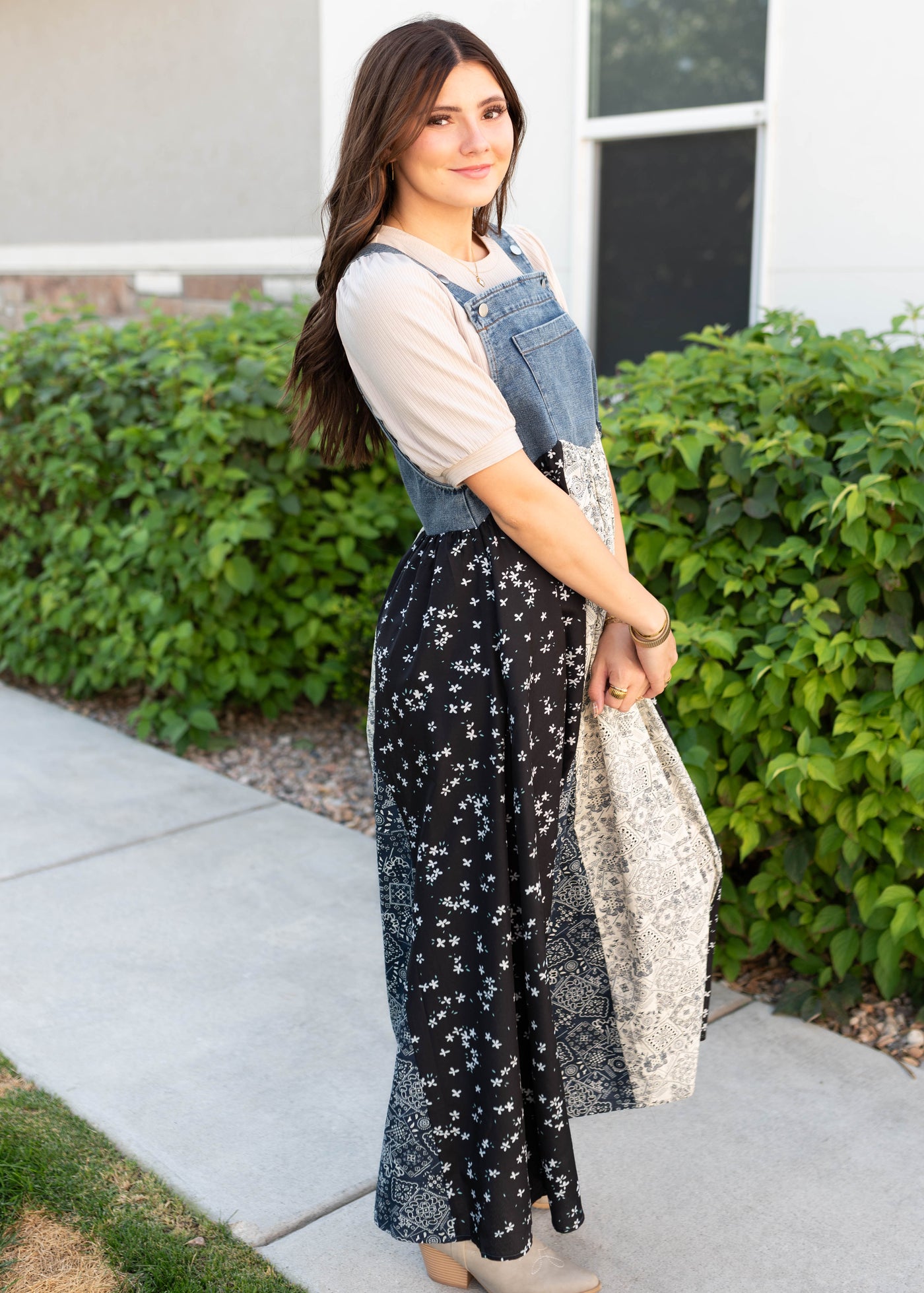 Side view of the modest denim patchwork overall dress