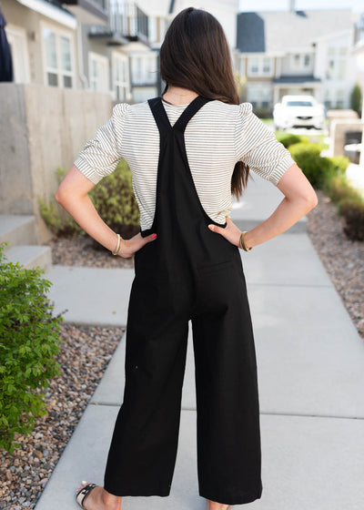Back view of the black knot strap overall