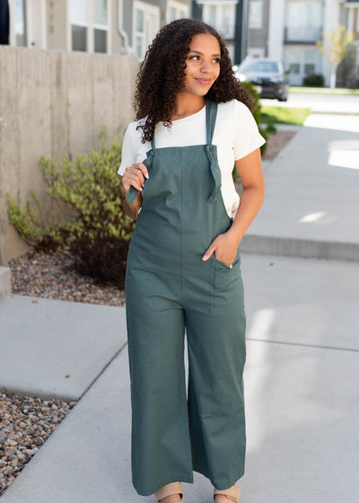 Dark jade knit strap overalls with front pockets