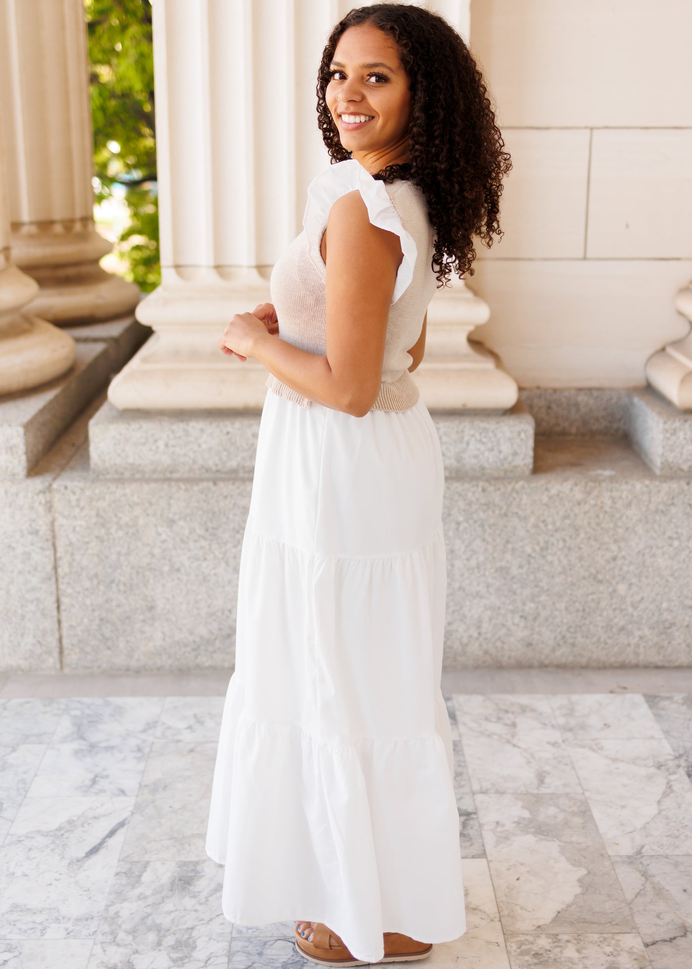 Side view of the white sweater vest dress