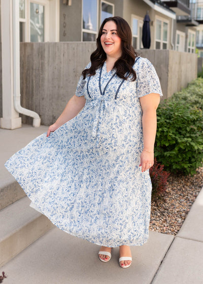 Plus size blue floral dress with tiered skirt