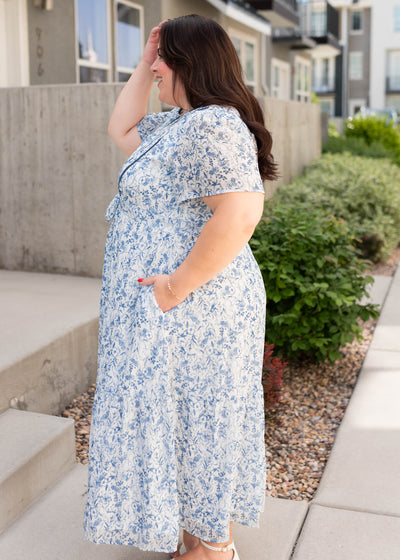 Side view of the plus size blue floral dress