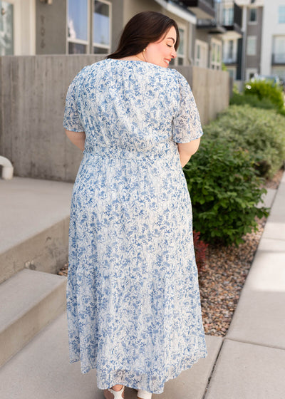 Back view of the plus size blue floral dress