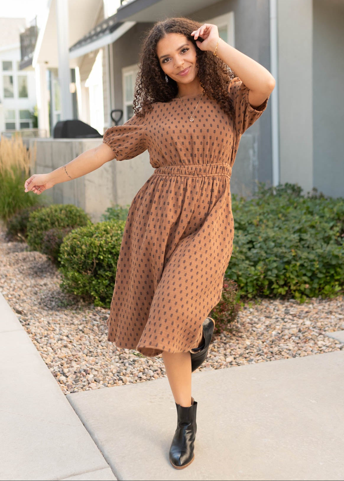 Elastic waist on the nutmeg textured dress sold at Lena Layne