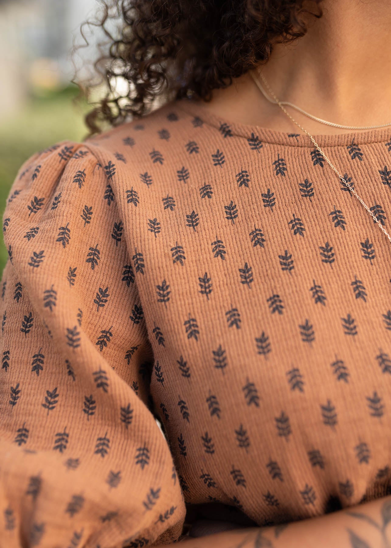 Close up of the fabric and pattern on the nutmeg textured dress