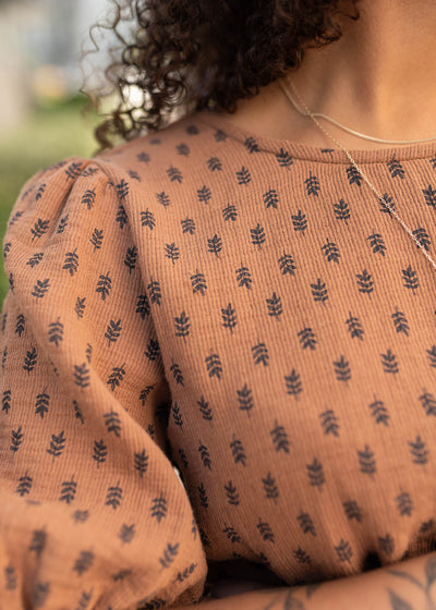 Close up of the fabric and pattern on the nutmeg textured dress