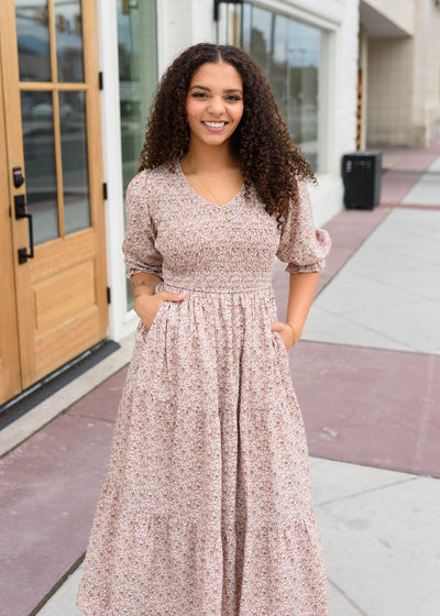 Modest V-neck dusty mauve floral dress with smocked bodice and tiered skirt