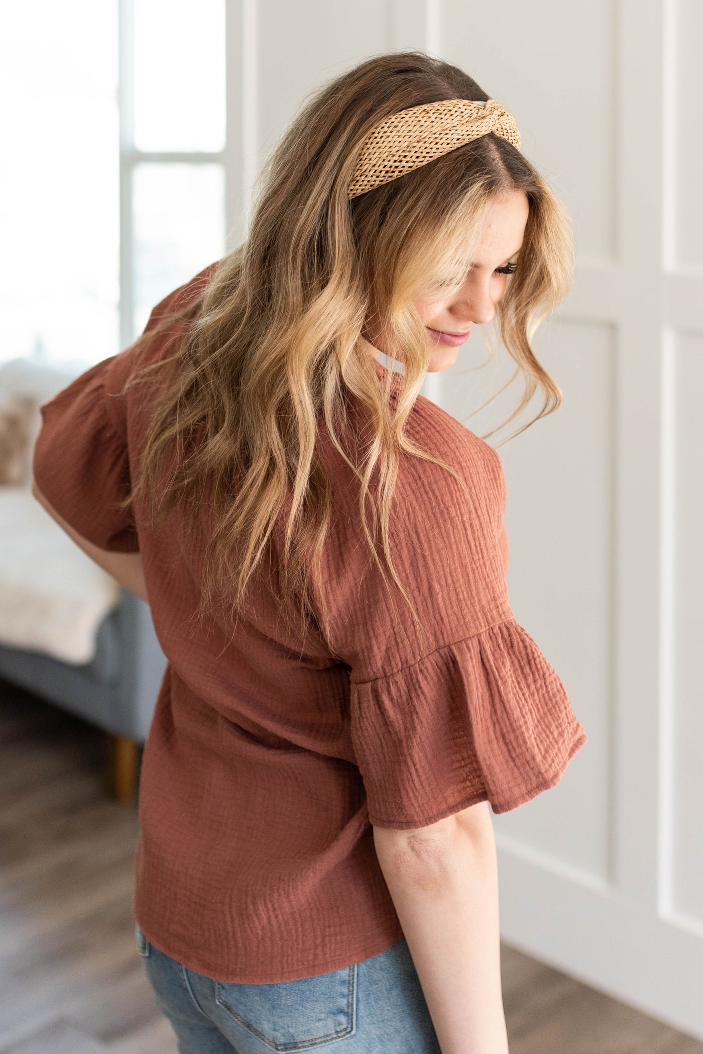 Side view of the terracotta blouse