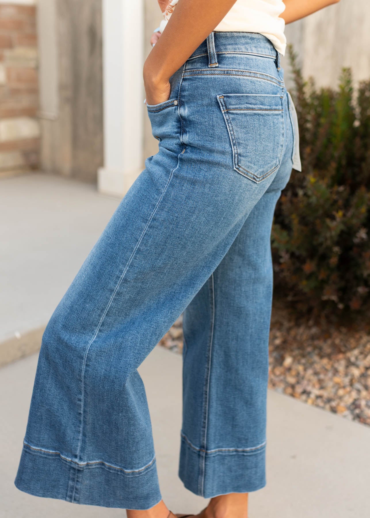 Side view of the denim wide leg pants