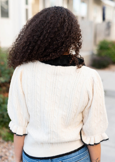 Black and cream collared top