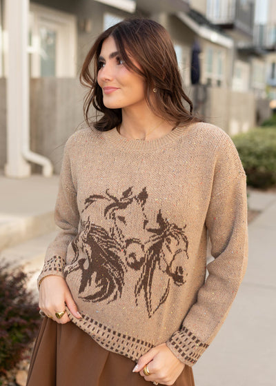 Long sleeve tan pattern sweater with three horses