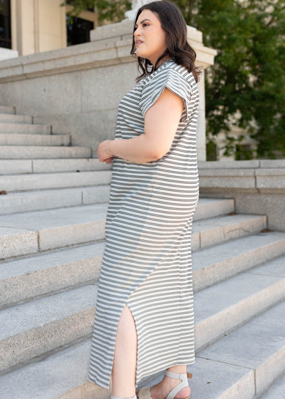 Side view of the black striped t-shirt dress in plus size
