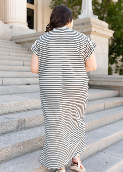 Back view of the black striped t-shirt dress in plus size