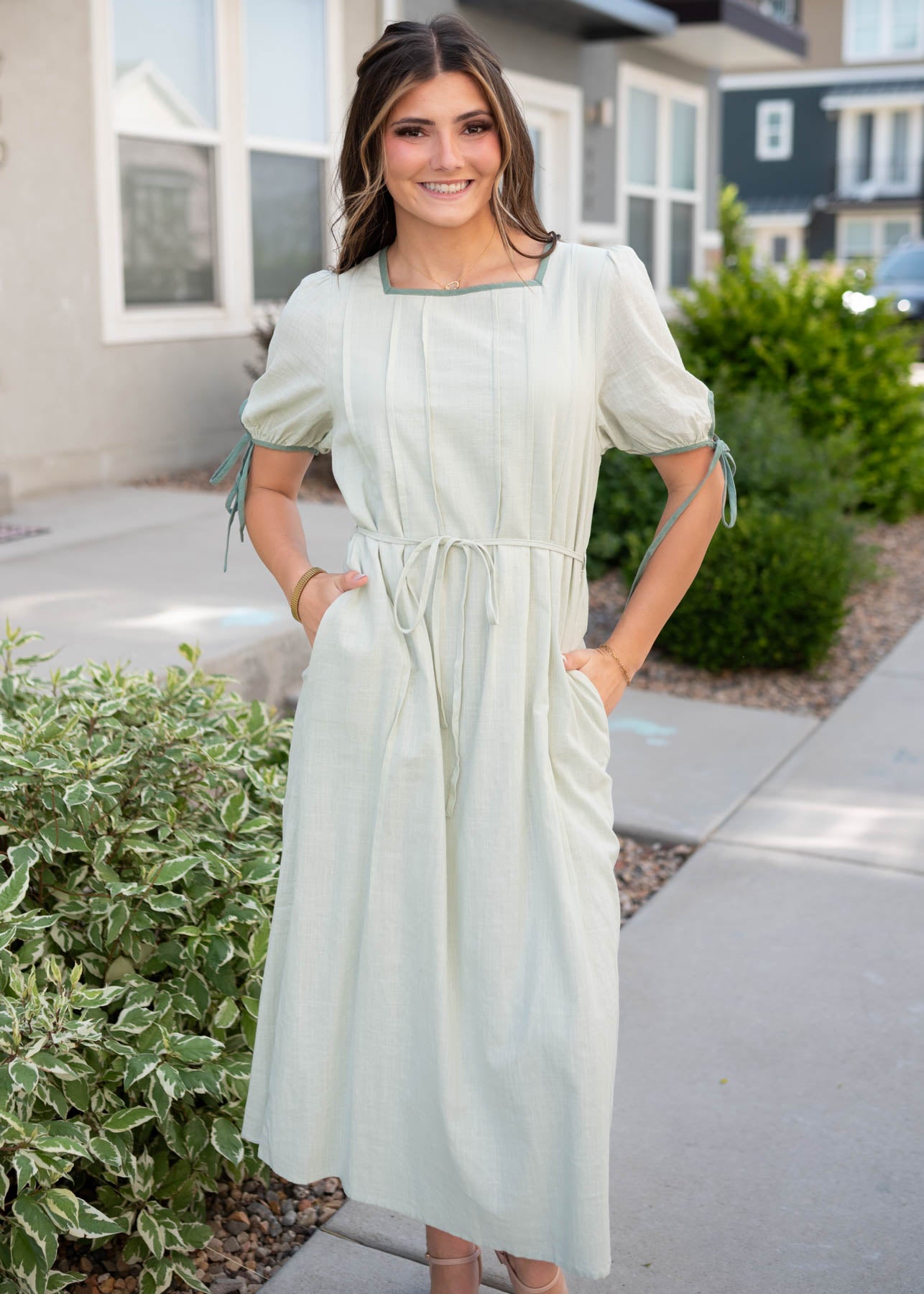 Sage dress with pockets and dark sage trim