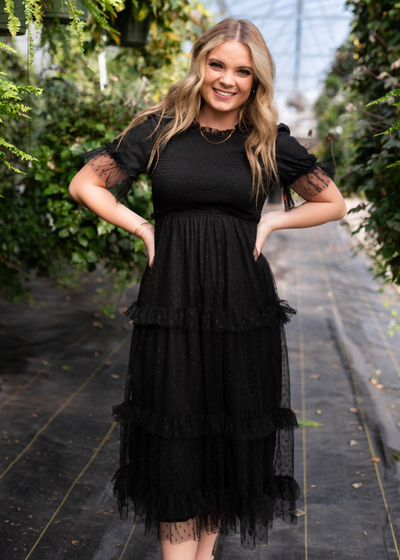 Black dress with ruffles on the skirt