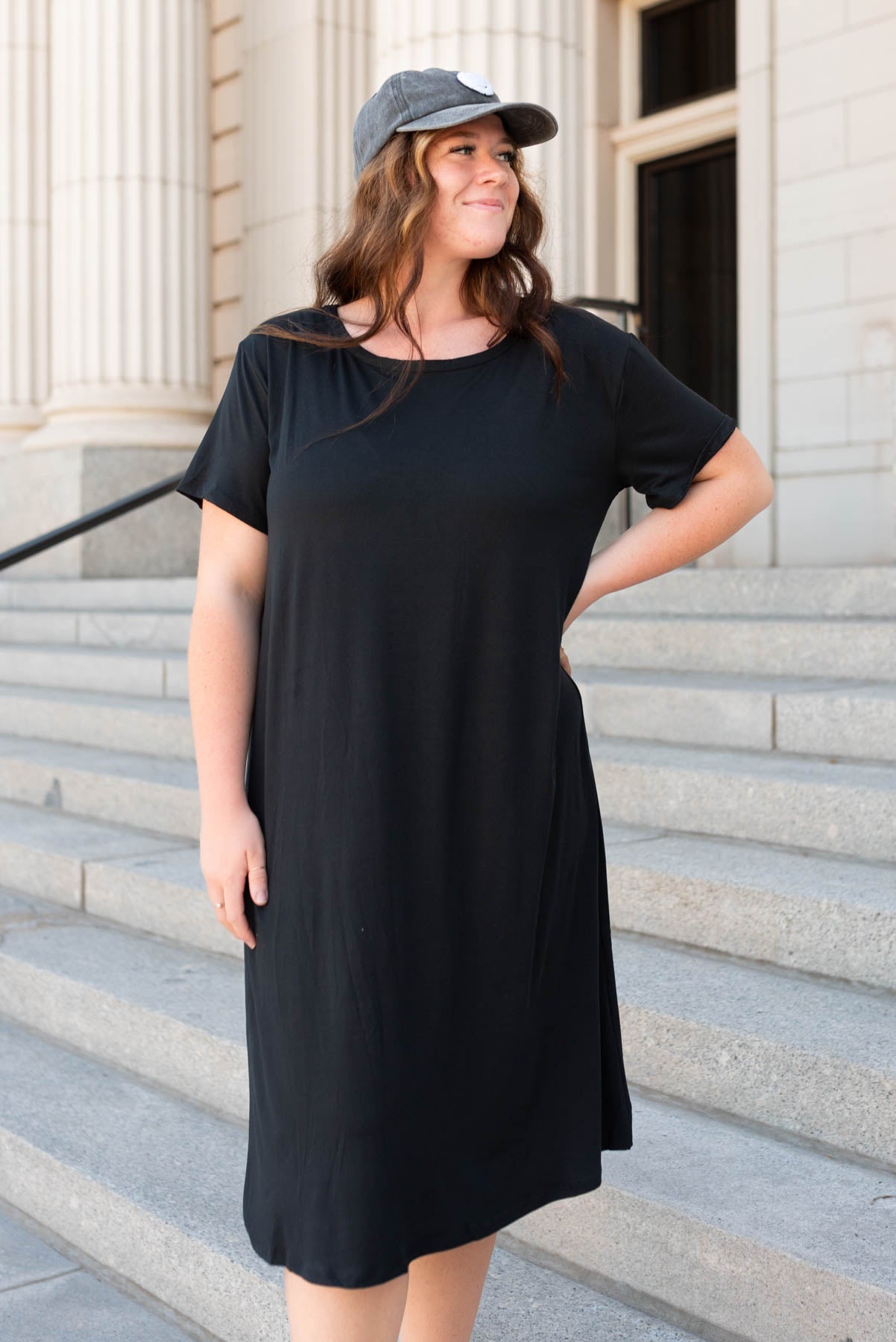 Front view of the plus size black tee shirt dress