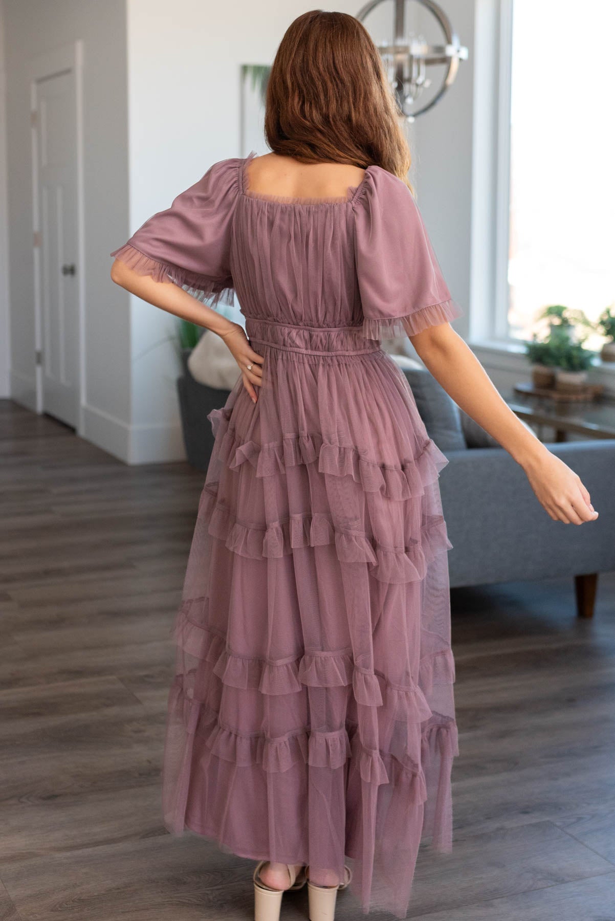 Back view of a dusty lavender maxi dress