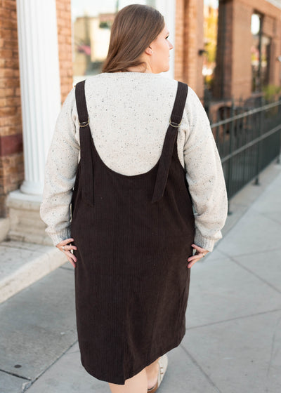 Back view of the brown corduroy overall dress in plus size