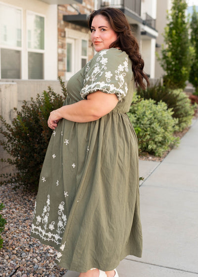 Side view of the modest forest green dress in plus size