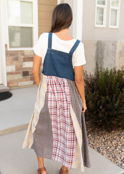 Back view ofthe denim patchwork plaid overall dress