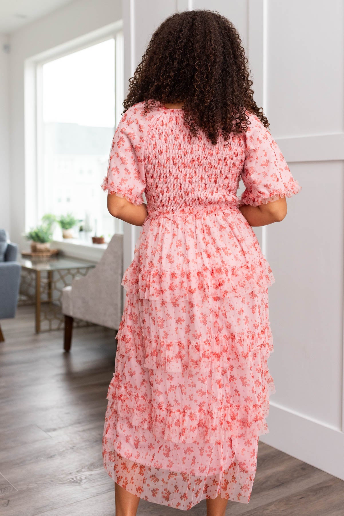 Back view of the pink mesh tiered dress