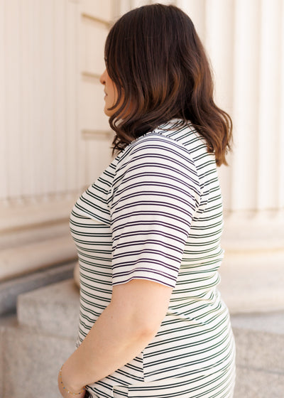 Side view of the plus size black striped top
