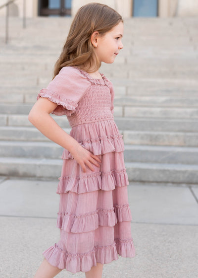 Side view of the dusty rose ruffle tiered little girl dress
