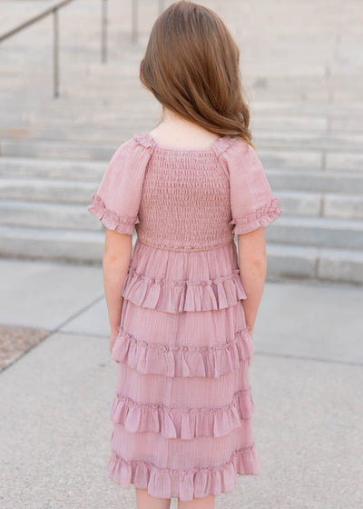 Back view of the dusty rose ruffle tiered little girl dress