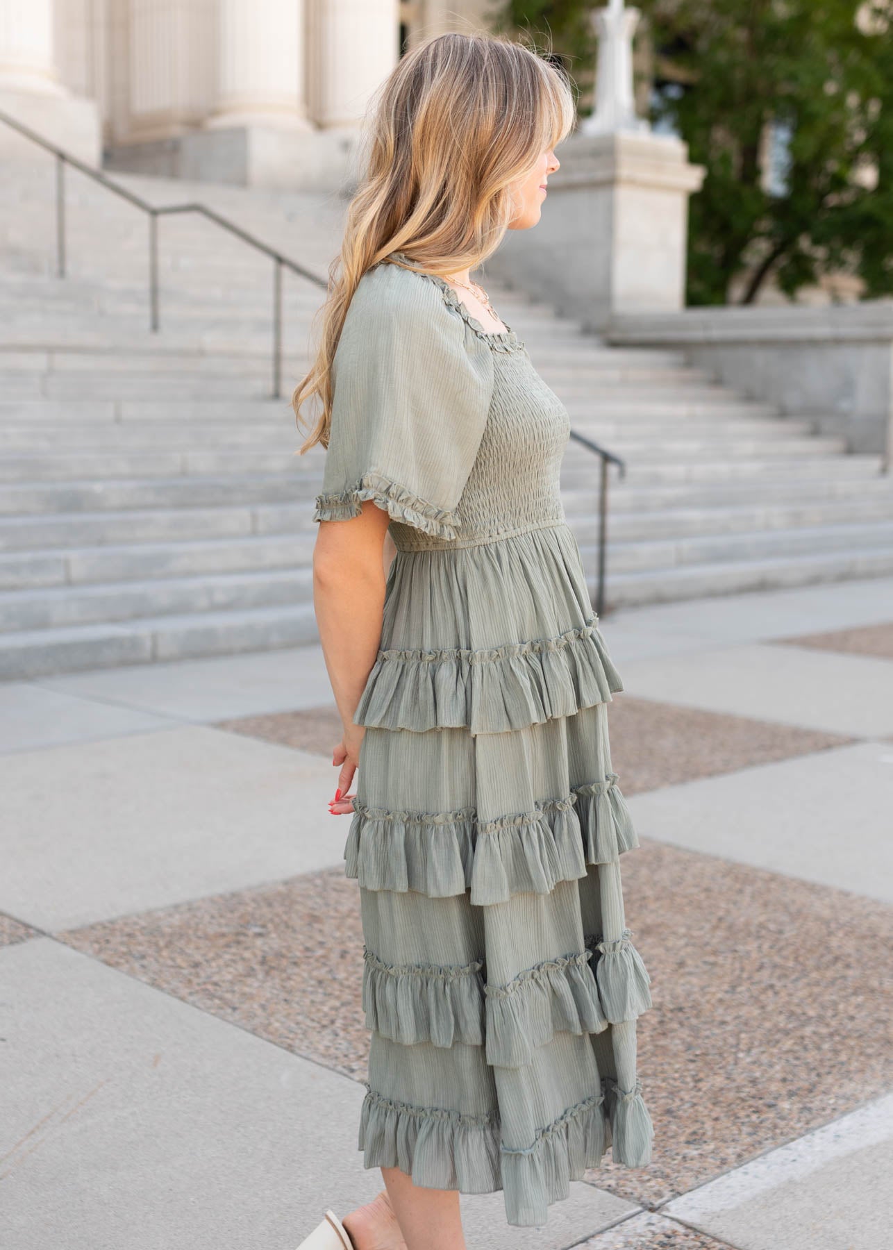 Side view of the sage ruffle tiered dress