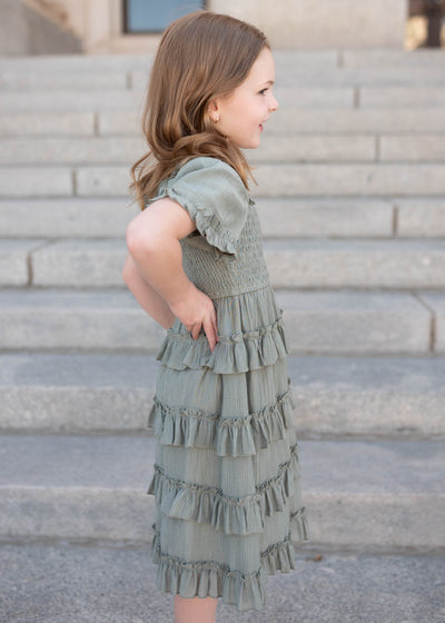 Side view of the sage ruffle tiered little girl dress