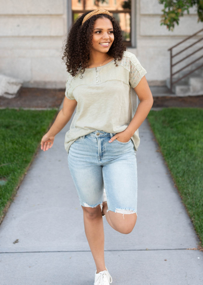 Three button moss green floral top