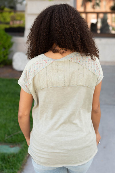 Back view of the moss green floral top