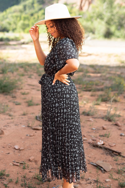 Side view of a black floral dress
