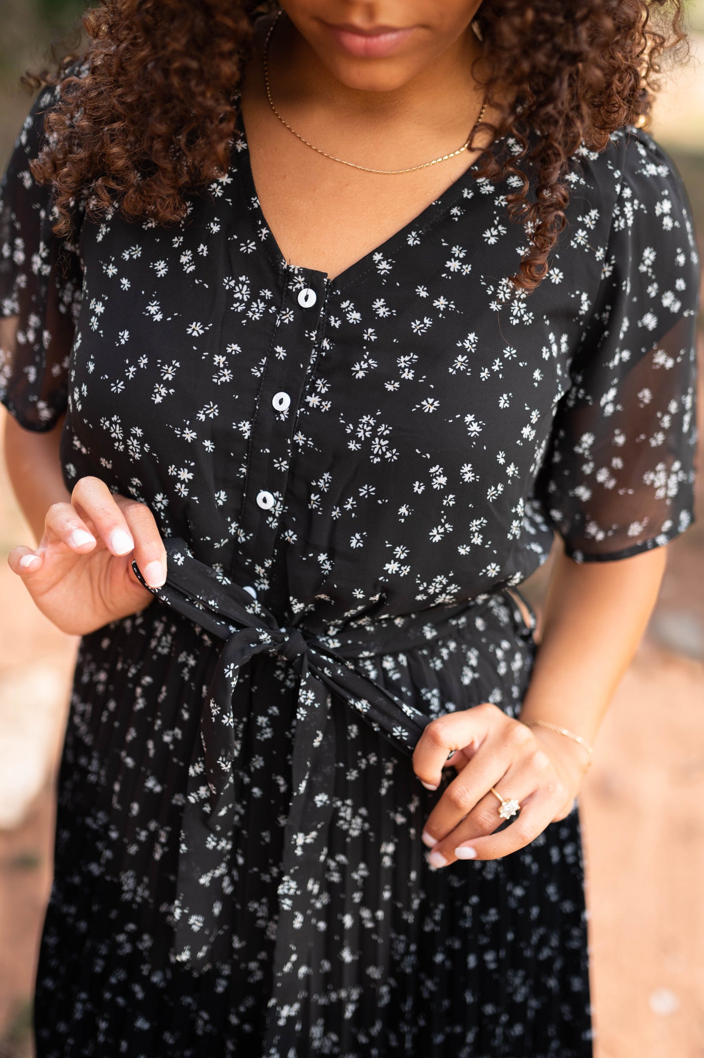 Black floral dress that ties at the waist