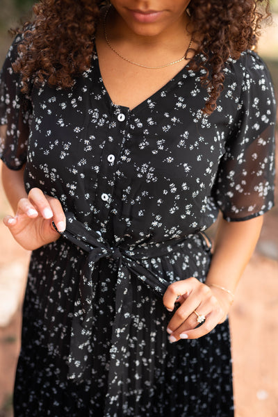 Black floral dress that ties at the waist