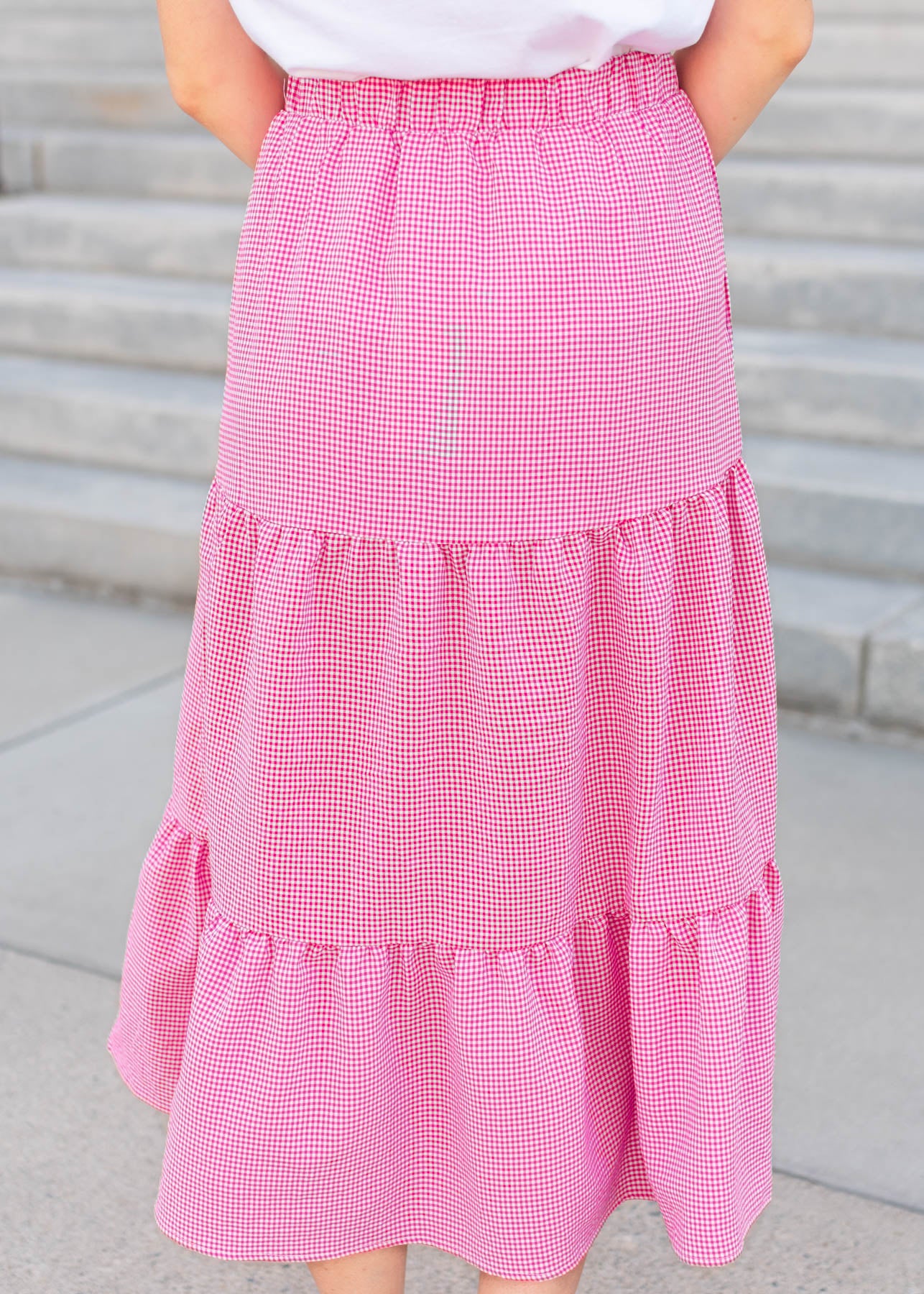 Back view of the dark pink gingham skirt